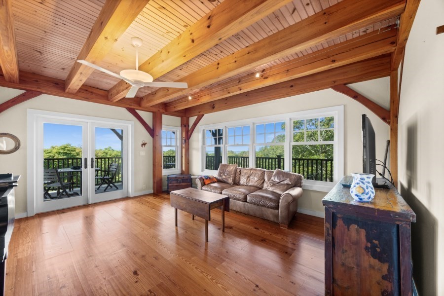 97 Longview Road West Tisbury, MA 02568 - Photo 28 of 42 a living room with furniture and a large window