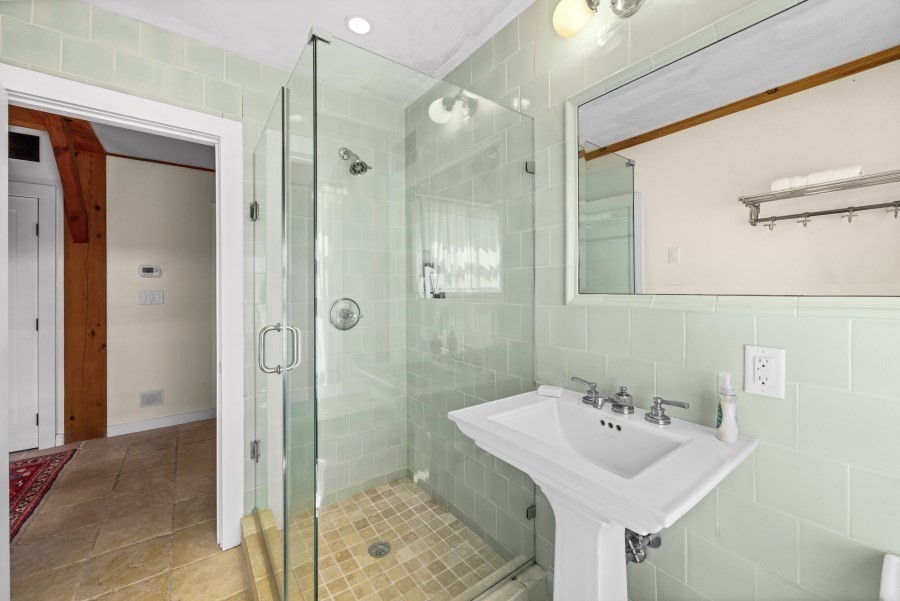 97 Longview Road West Tisbury, MA 02568 - Photo 32 of 42 a bathroom with a sink toilet and shower