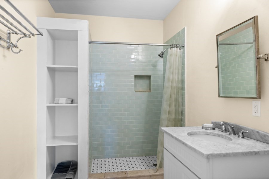 97 Longview Road West Tisbury, MA 02568 - Photo 38 of 42 a bathroom with a sink and a mirror