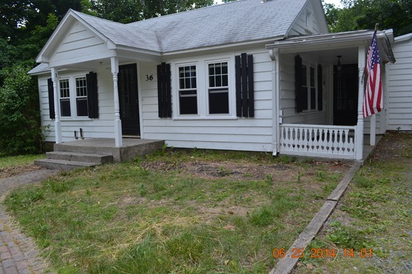36 Brown Road Shirley, MA 01464 - Photo 1 of 8 a view of a house with a yard
