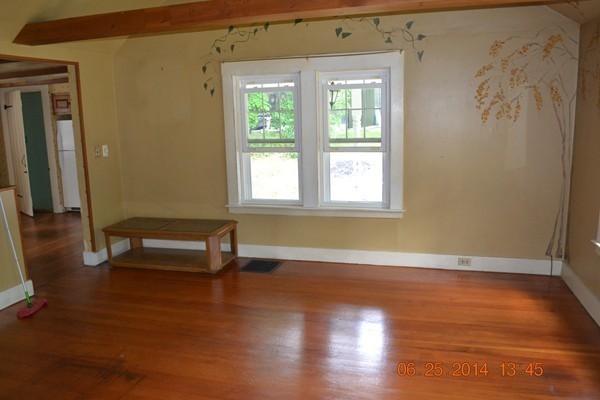36 Brown Road Shirley, MA 01464 - Photo 4 of 8 a view of room with window and wooden floor
