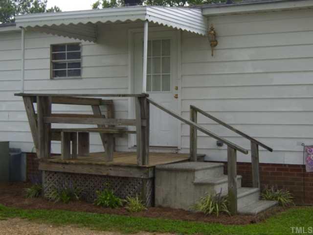 319 Oak Valley Road Coats, NC 27521 - Photo 3 of 11 Rear covered deck