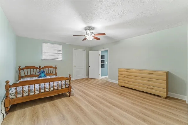 a view of a room with toys and a wooden floor