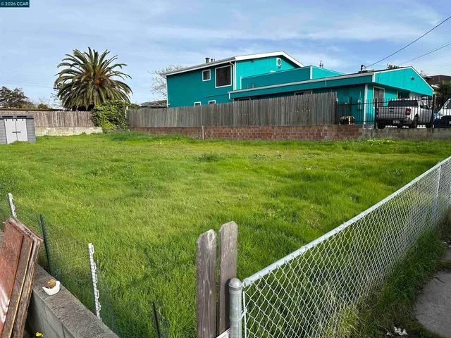 a view of a backyard with a garden