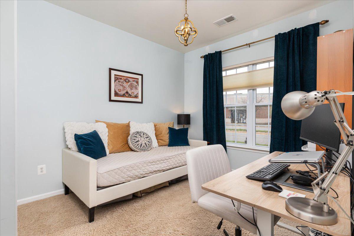 25436 South Riding Boulevard, Unit 2H Chantilly, VA 20152 - Photo 3 of 26 a living room with furniture and a window
