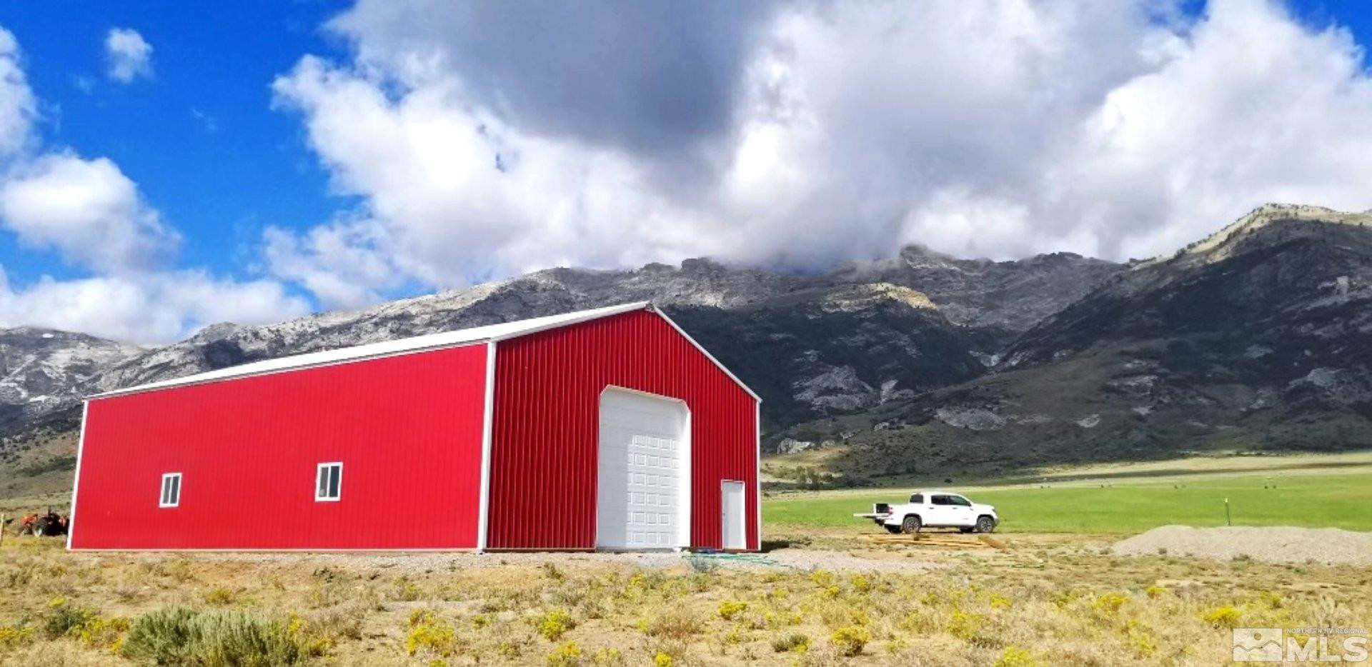 a view of swimming pool with a yard