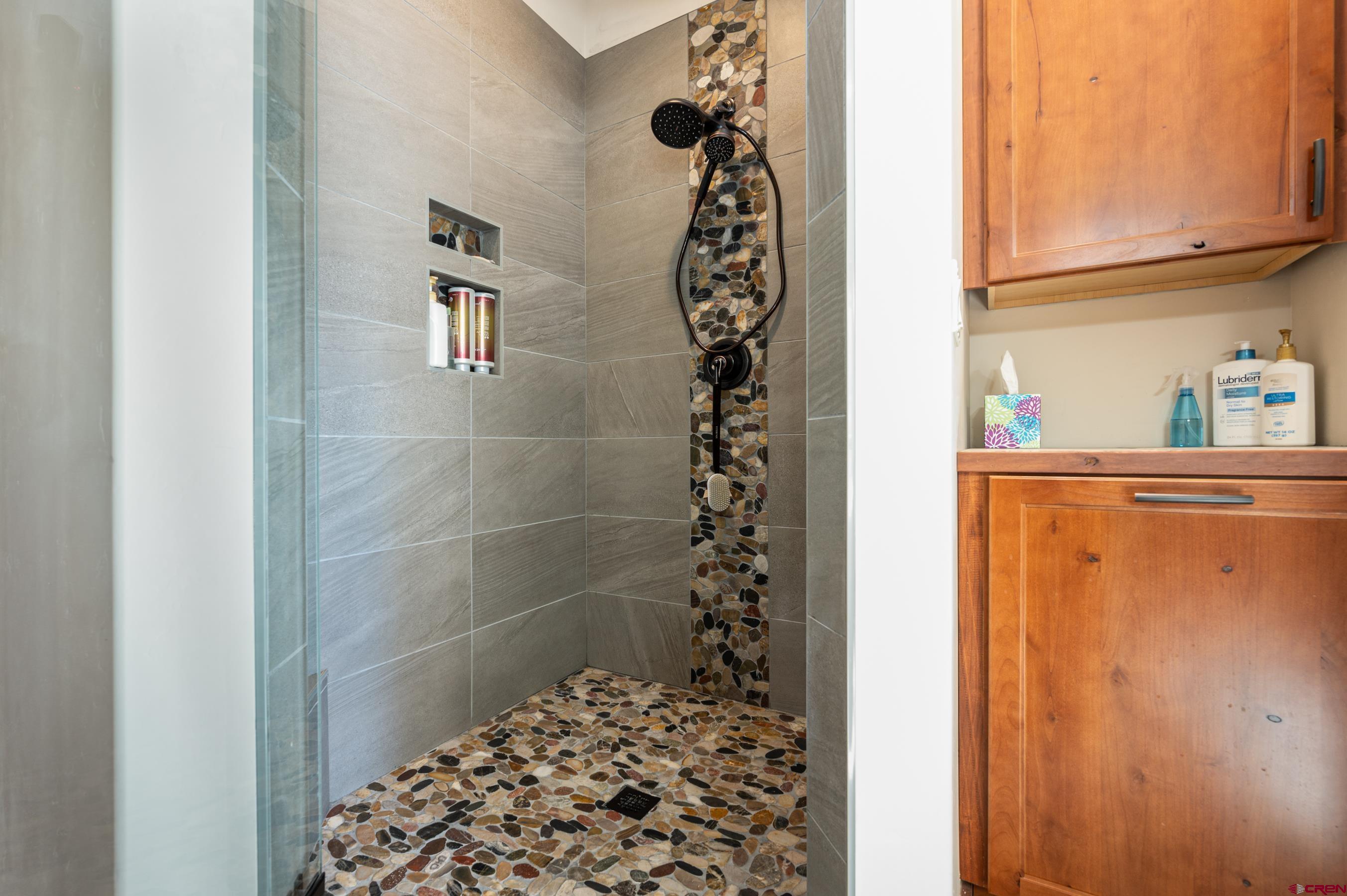 180 Ridge Road Durango, CO 81303 - Photo 16 of 35 a bathroom with a shower