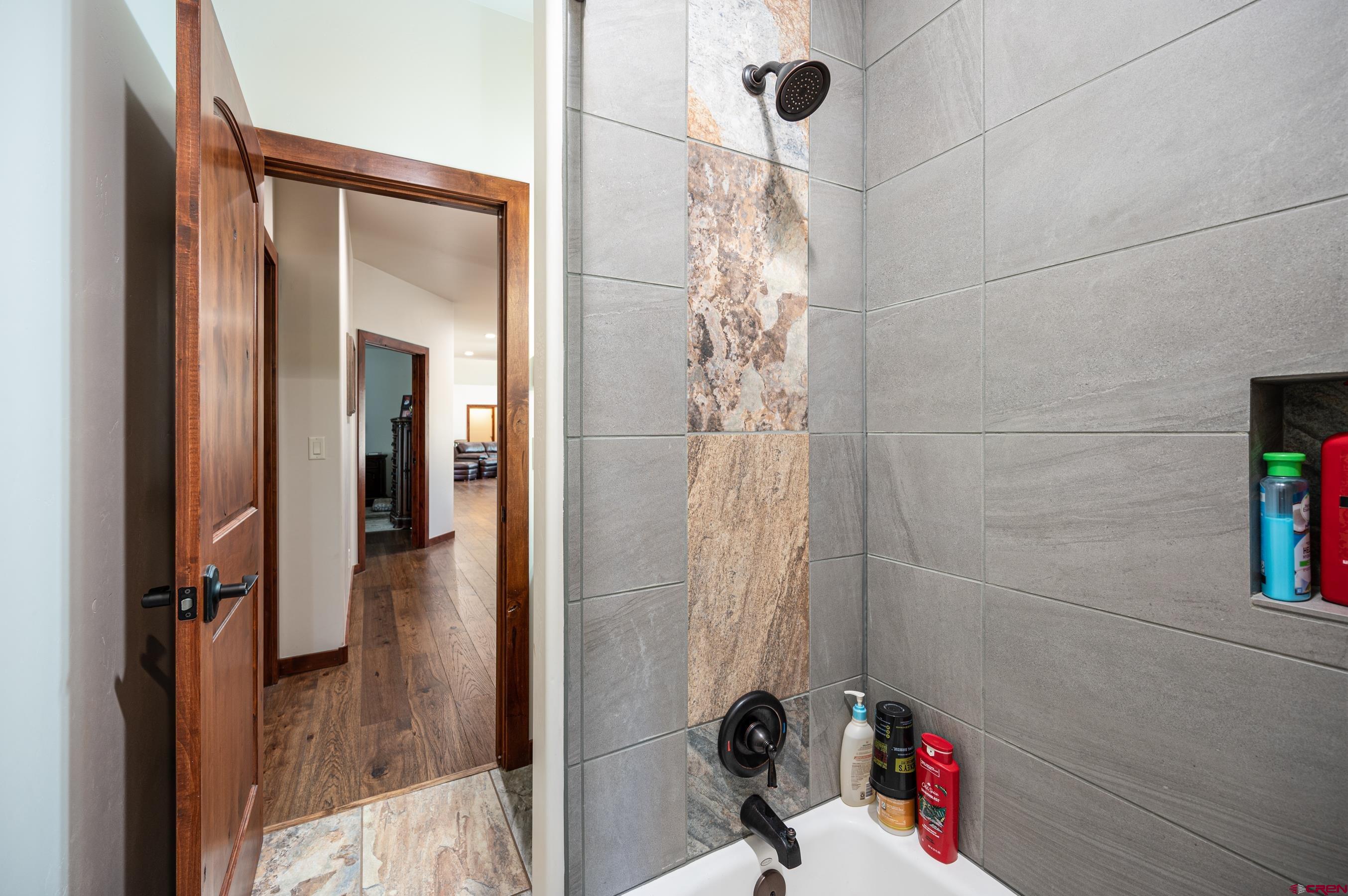 180 Ridge Road Durango, CO 81303 - Photo 25 of 35 a white toilet sitting next to a small window