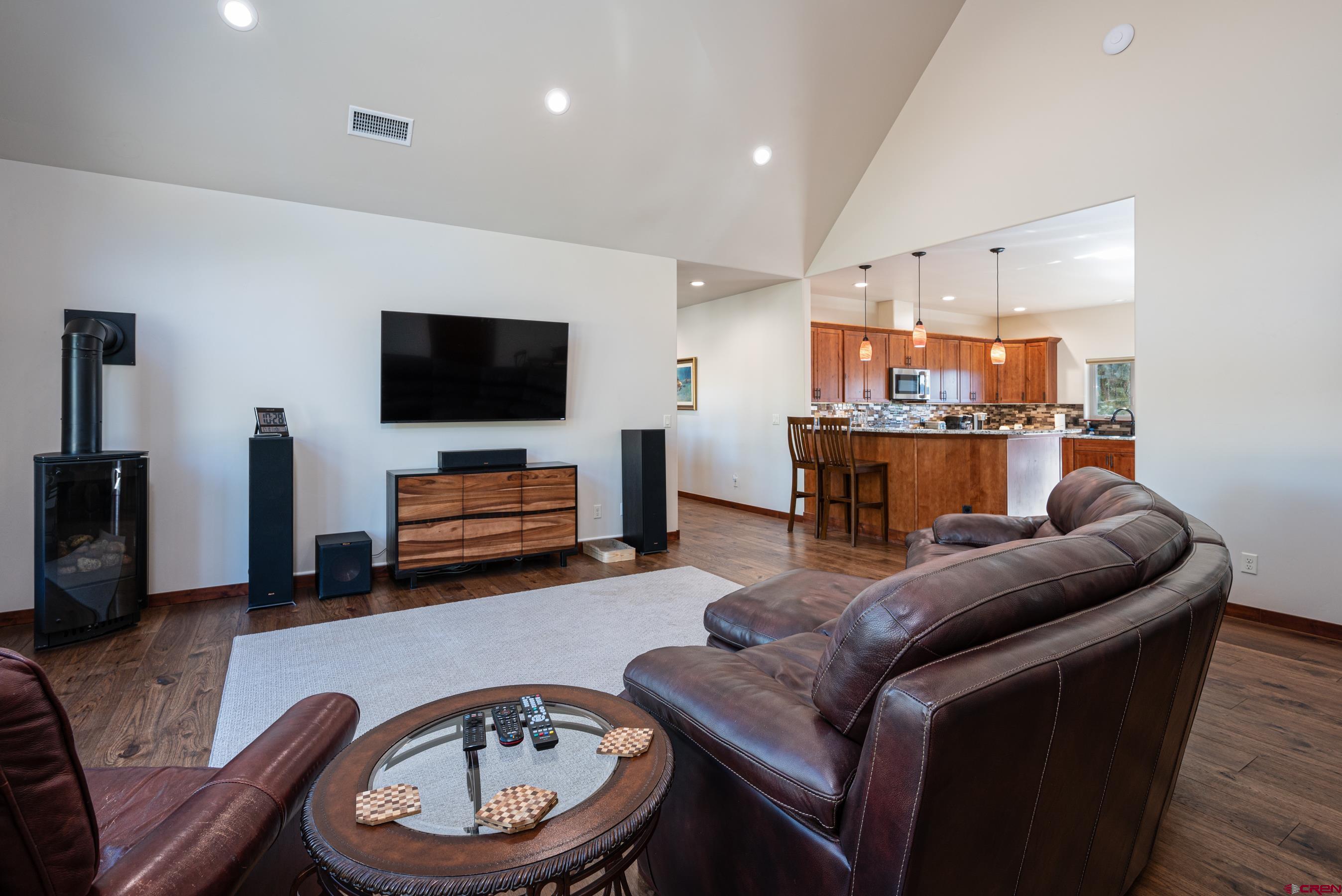 180 Ridge Road Durango, CO 81303 - Photo 7 of 35 a living room with furniture and a flat screen tv