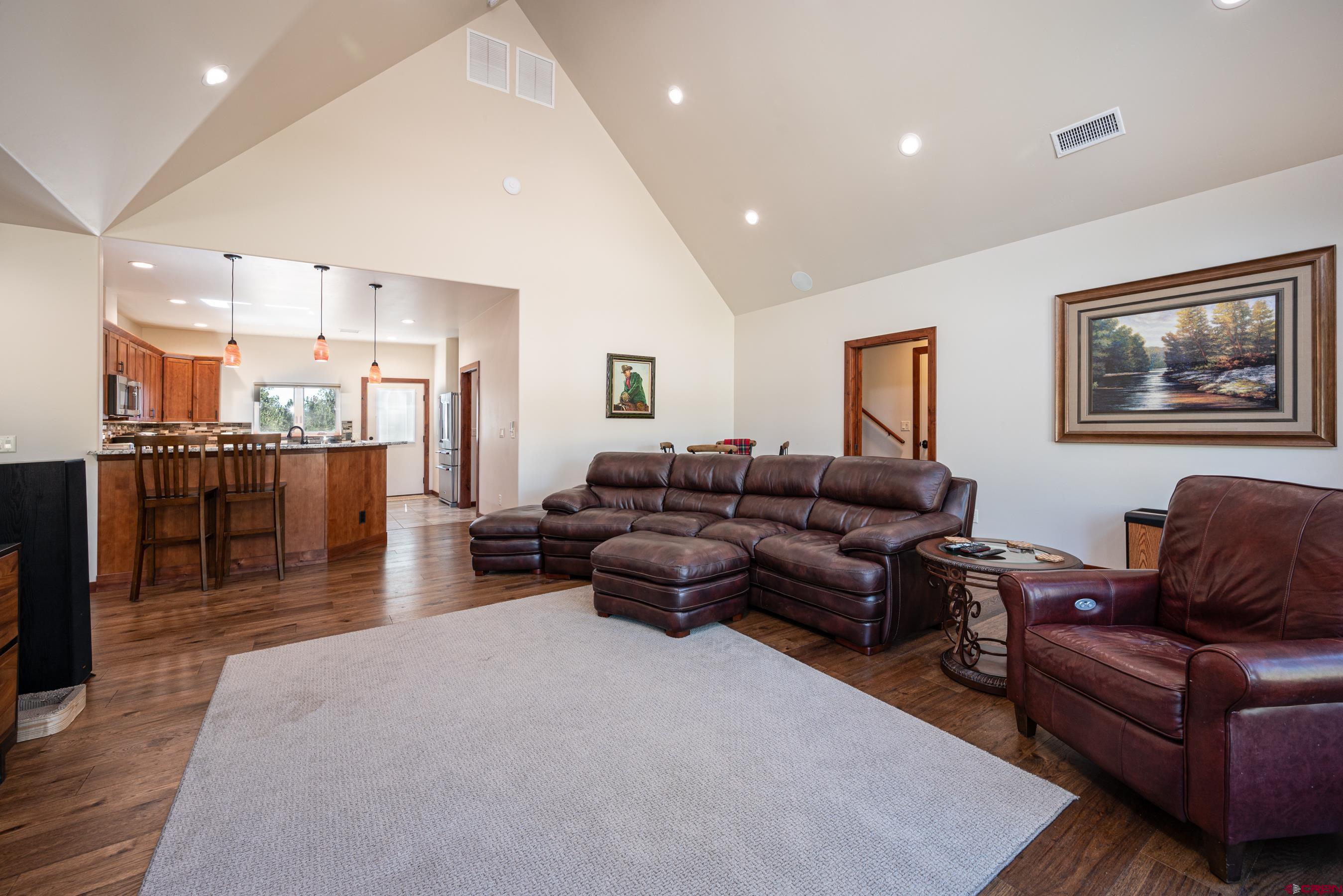 180 Ridge Road Durango, CO 81303 - Photo 8 of 35 a living room with furniture and a wooden floor