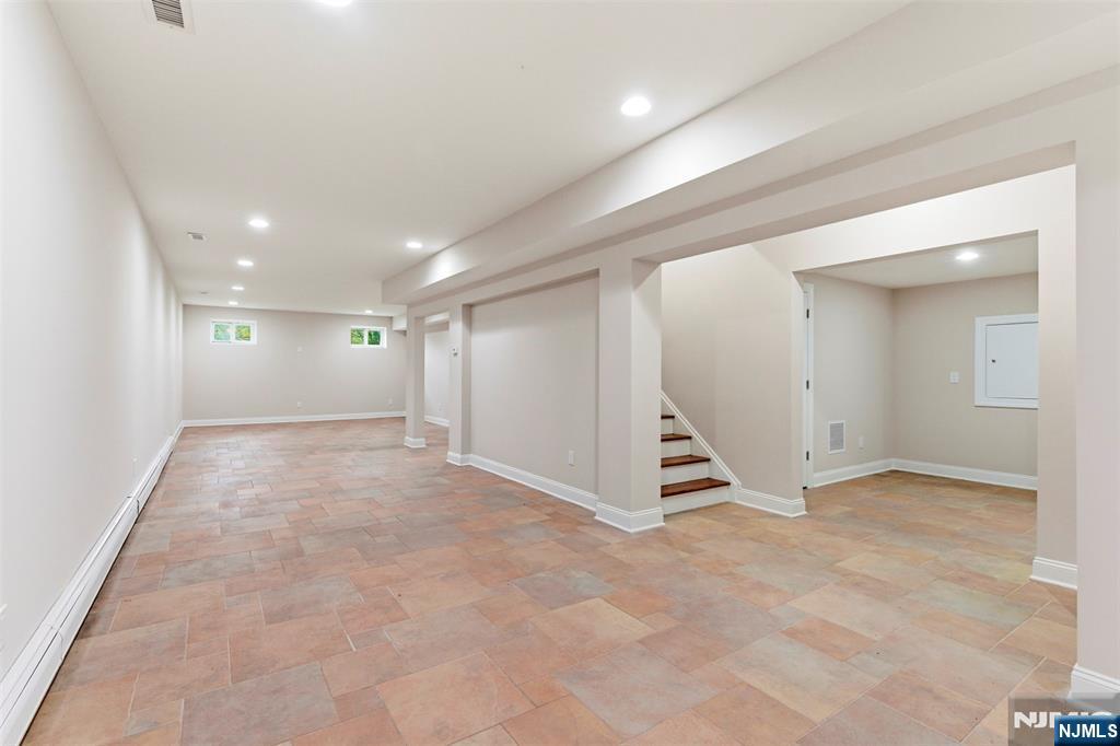 767 Orangeburgh Road River Vale, NJ 07675 - Photo 38 of 49 an empty room with a ceiling fan and entryway