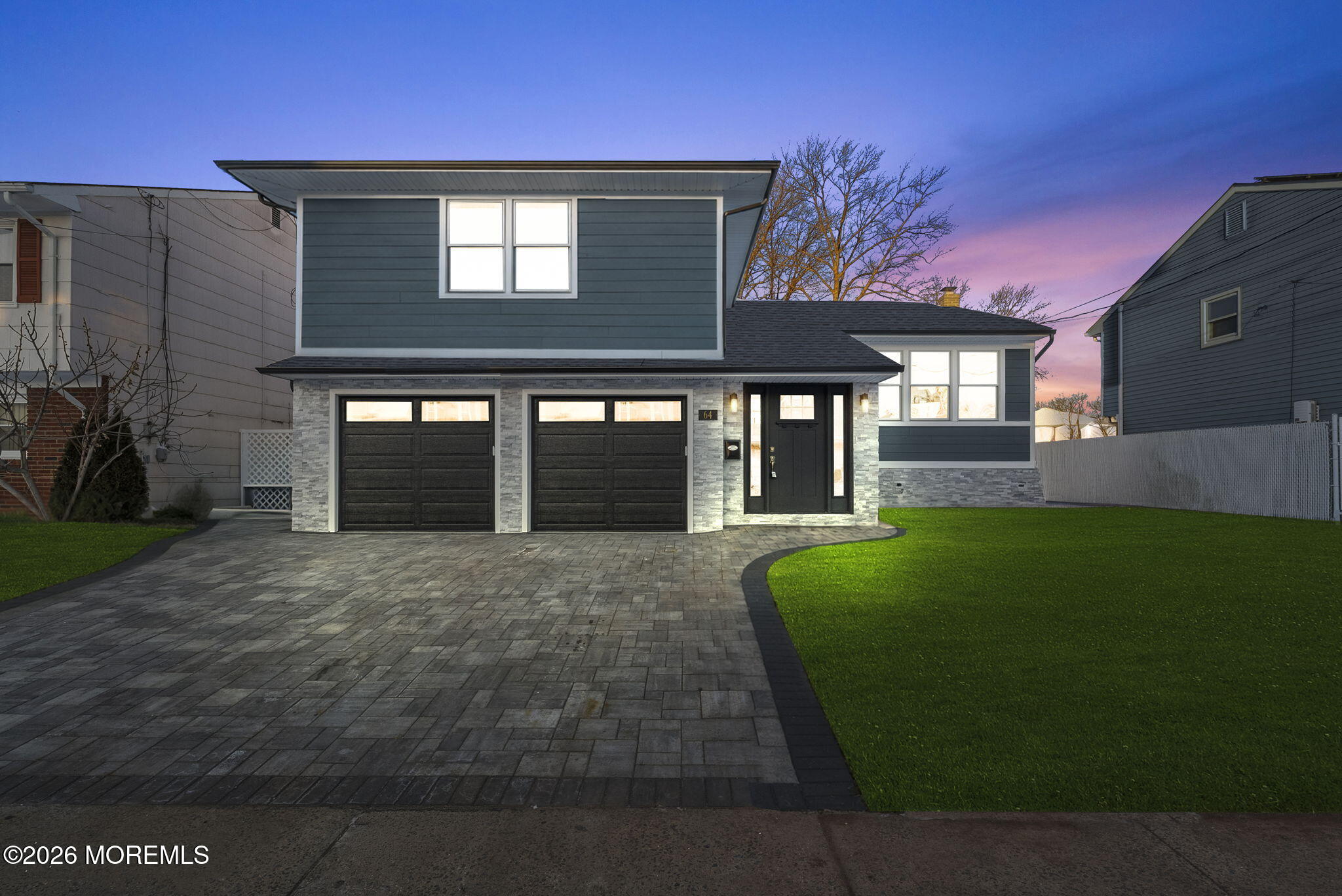 64 South Cliff Road Colonia, NJ 07067 - Photo 1 of 49 a front view of a house with a yard and garage