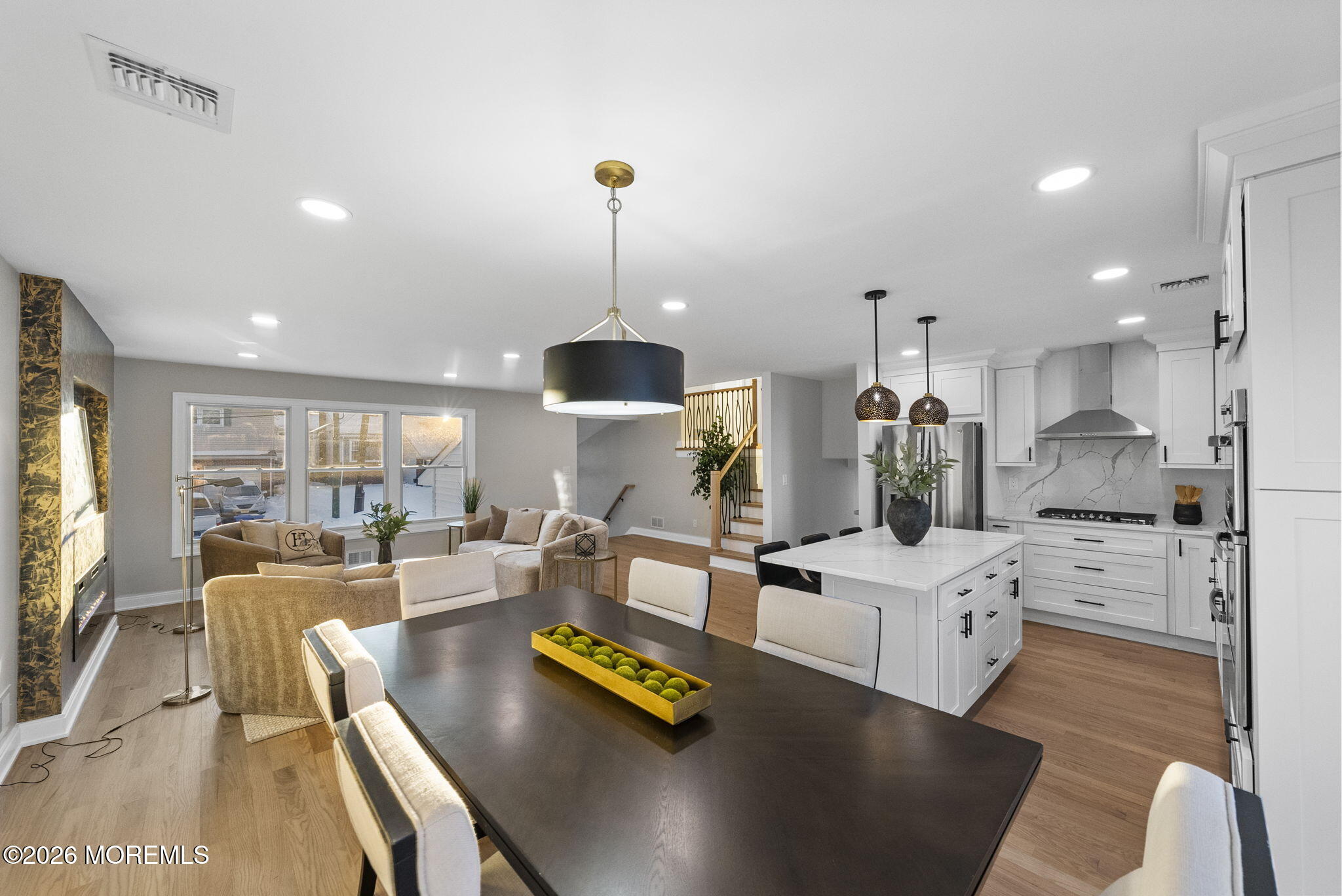 64 South Cliff Road Colonia, NJ 07067 - Photo 13 of 49 a living room with furniture fireplace and kitchen view