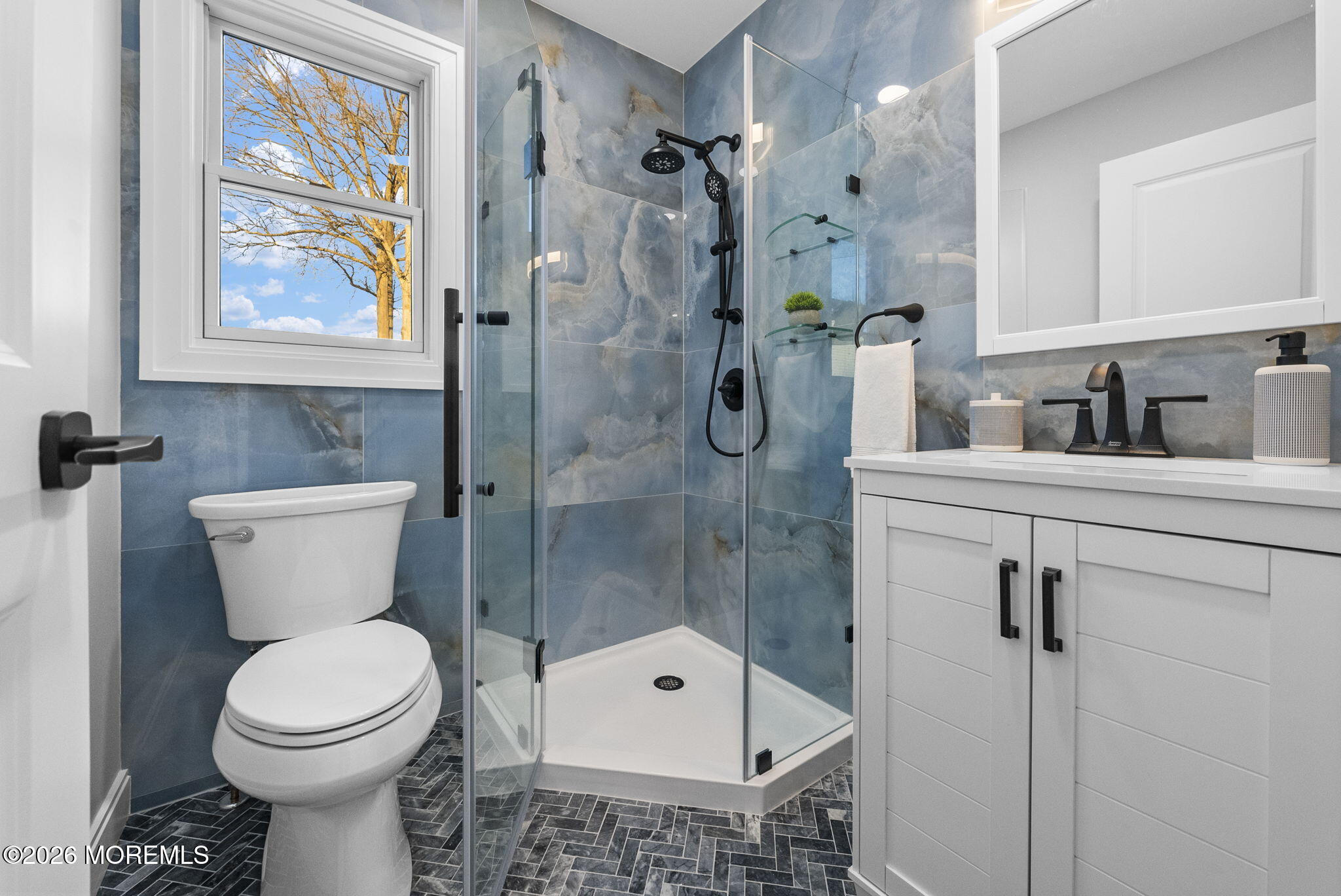 64 South Cliff Road Colonia, NJ 07067 - Photo 20 of 49 a bathroom with a toilet sink and shower