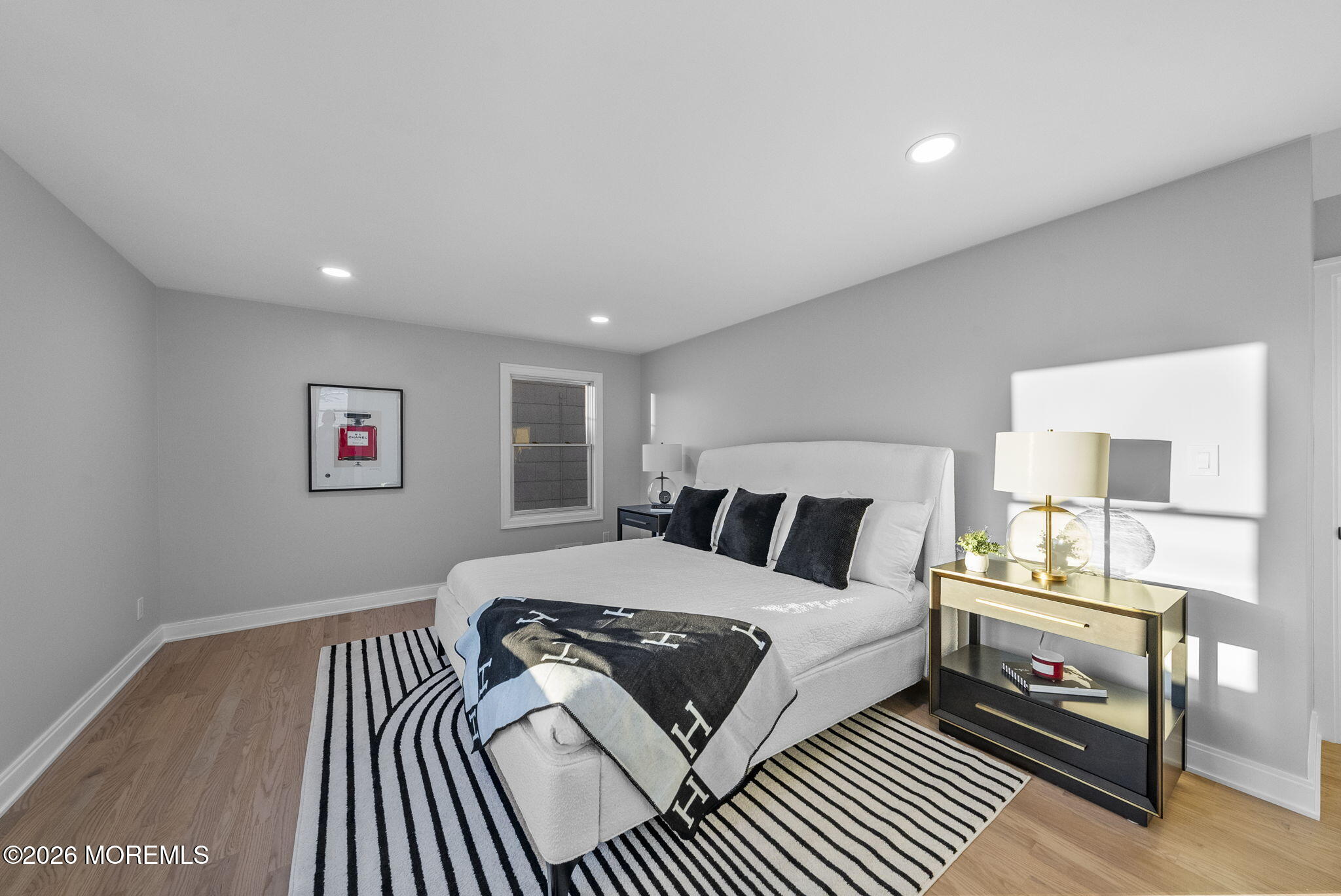 64 South Cliff Road Colonia, NJ 07067 - Photo 25 of 49 a bedroom with a bed and a night stand