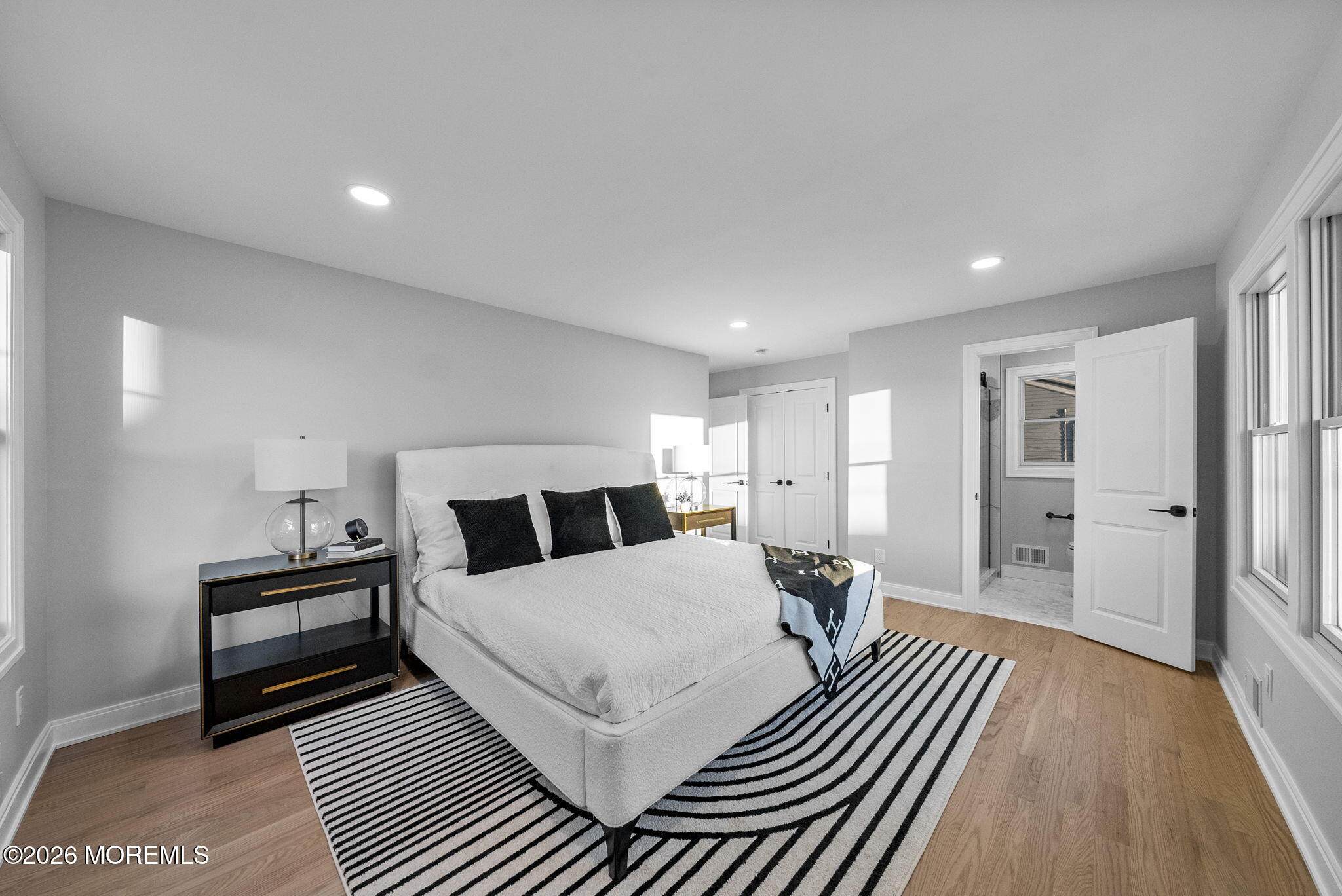 64 South Cliff Road Colonia, NJ 07067 - Photo 26 of 49 a living room with a bed and a wooden floor