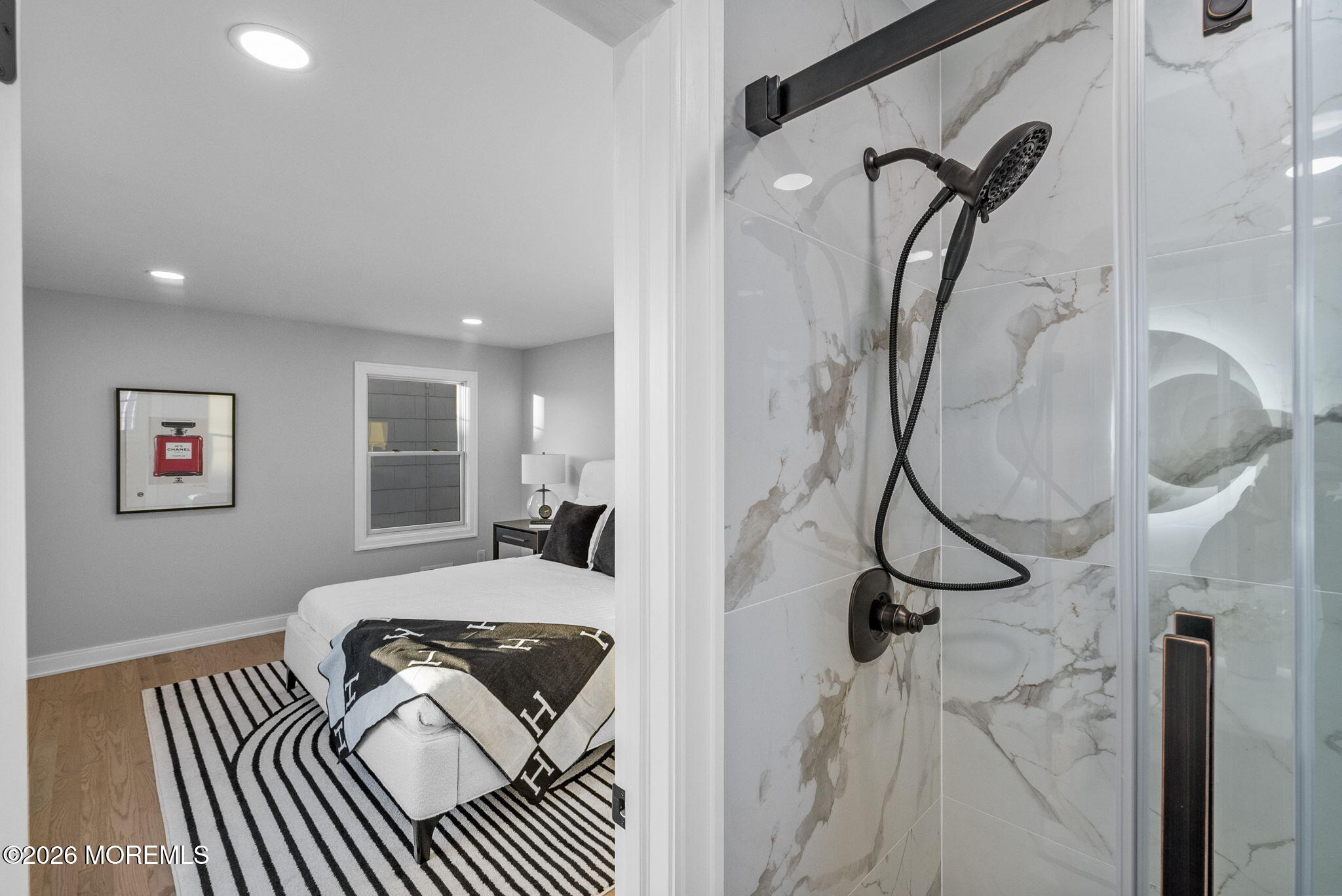 64 South Cliff Road Colonia, NJ 07067 - Photo 28 of 49 a bedroom with a bed and a painting on the wall