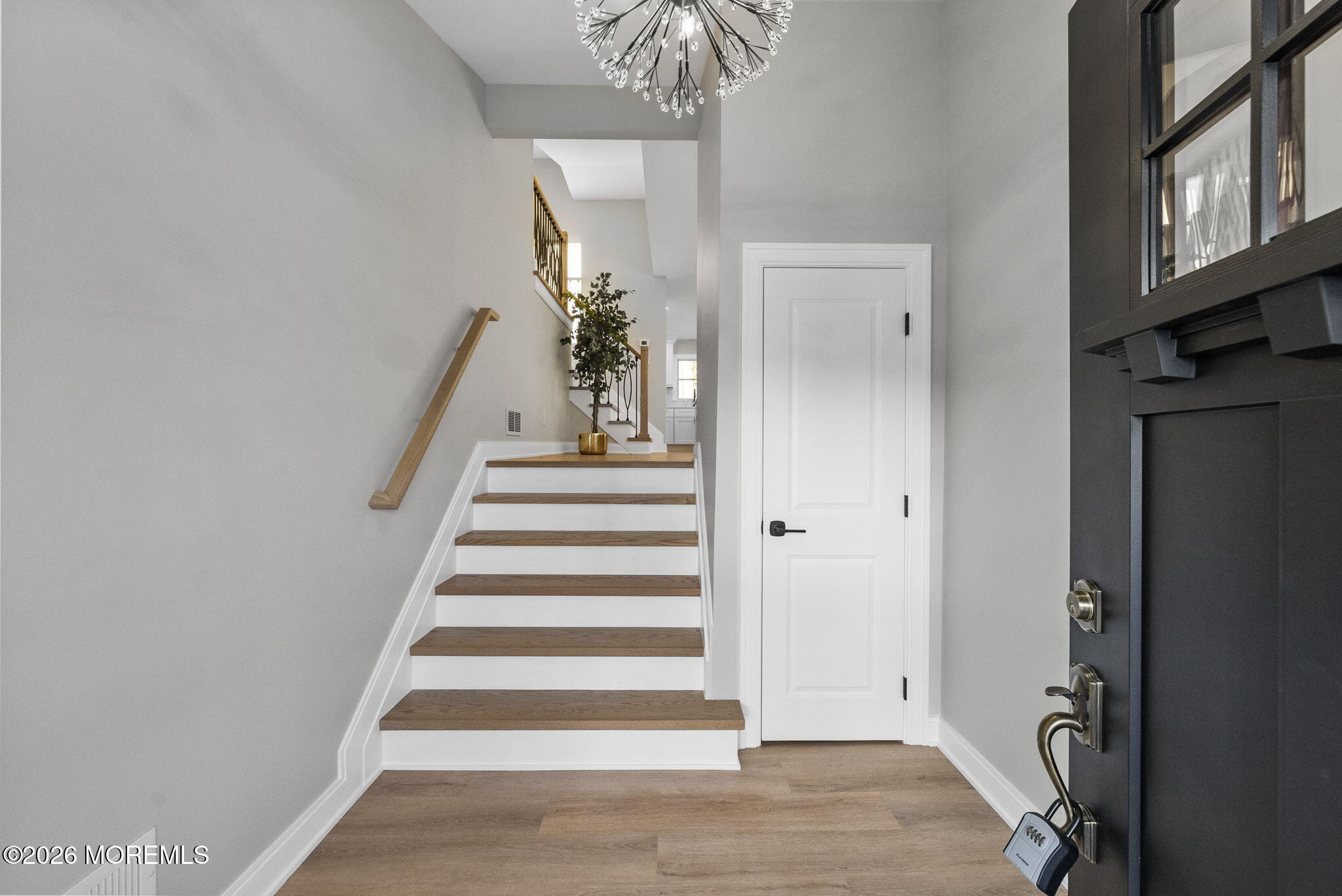 64 South Cliff Road Colonia, NJ 07067 - Photo 3 of 49 a view of an entryway with wooden floor
