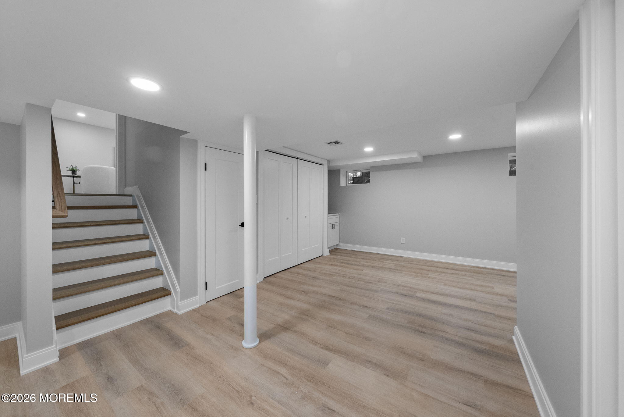 64 South Cliff Road Colonia, NJ 07067 - Photo 36 of 49 a view of a livingroom with wooden floor and entryway