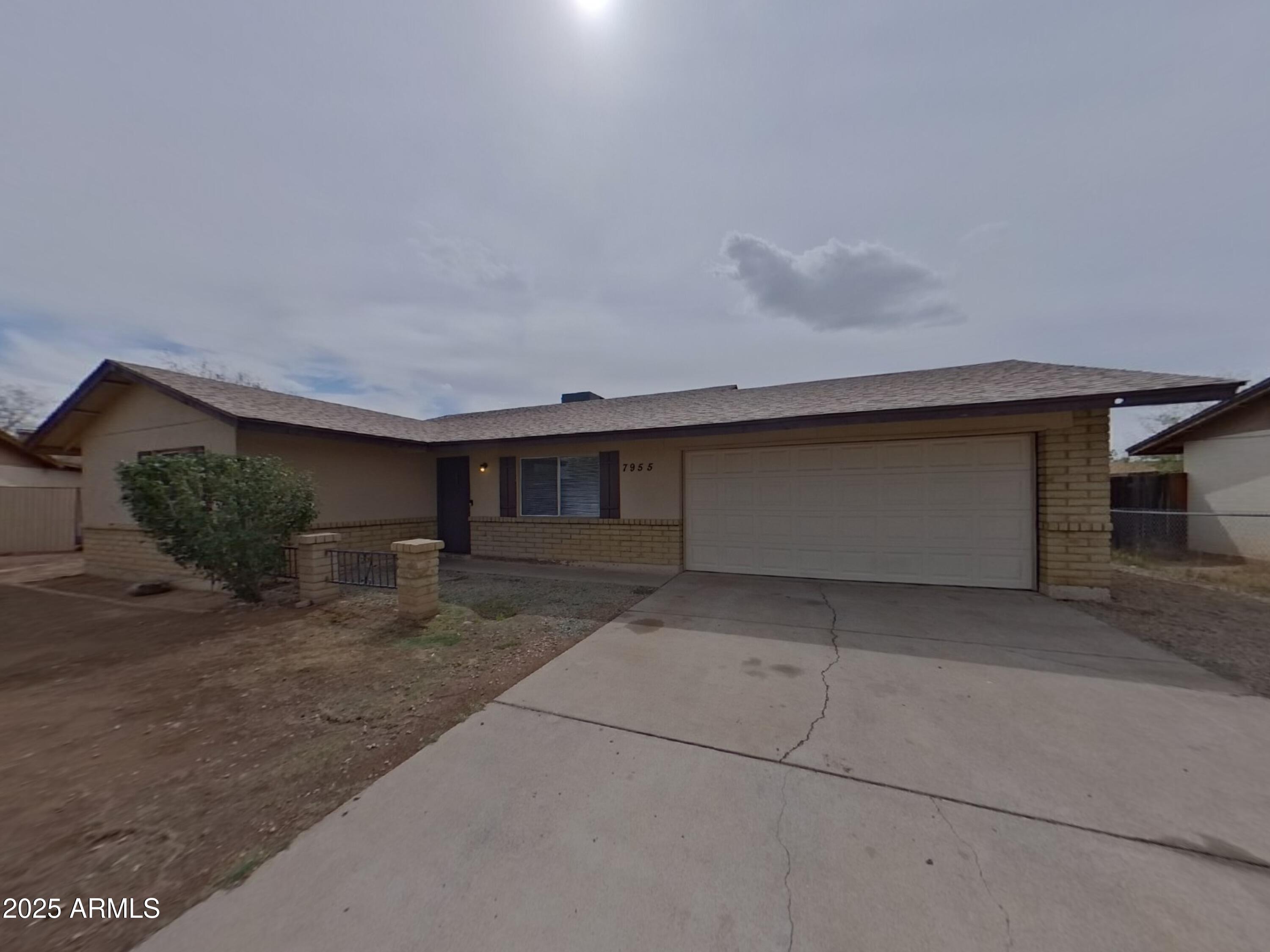 a view of a house with garage