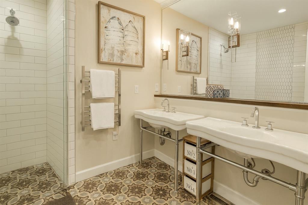 21135 Peckham Avenue Mount Dora, FL 32757 - Photo 13 of 39 a bathroom with a sink and a mirror