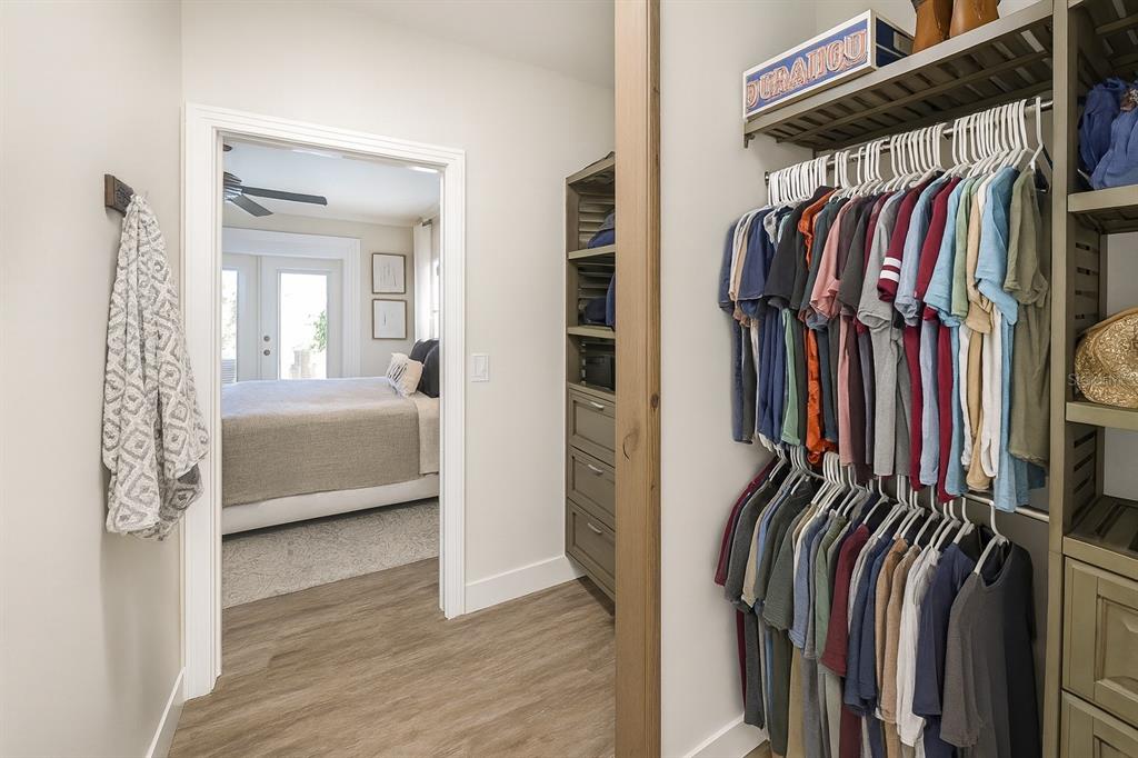 21135 Peckham Avenue Mount Dora, FL 32757 - Photo 14 of 39 a view of walk in closet with clothes and shoes