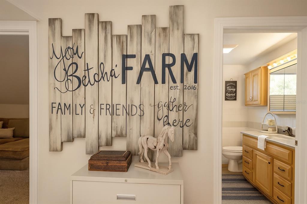 21135 Peckham Avenue Mount Dora, FL 32757 - Photo 20 of 39 a bathroom with a shower and a toilet