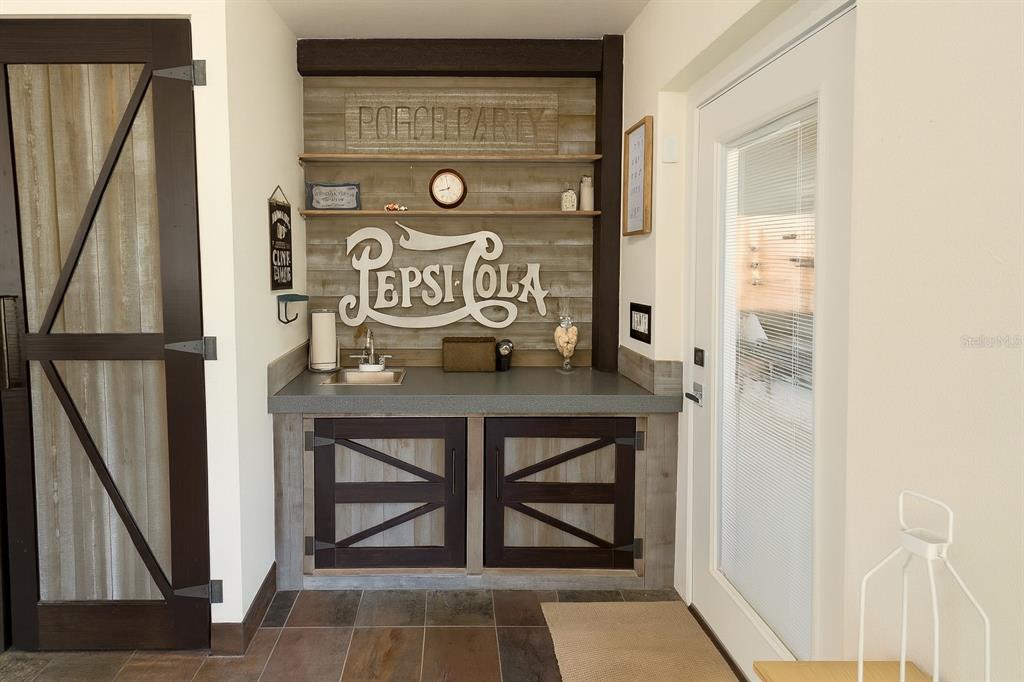 21135 Peckham Avenue Mount Dora, FL 32757 - Photo 26 of 39 a view of front door with stairs