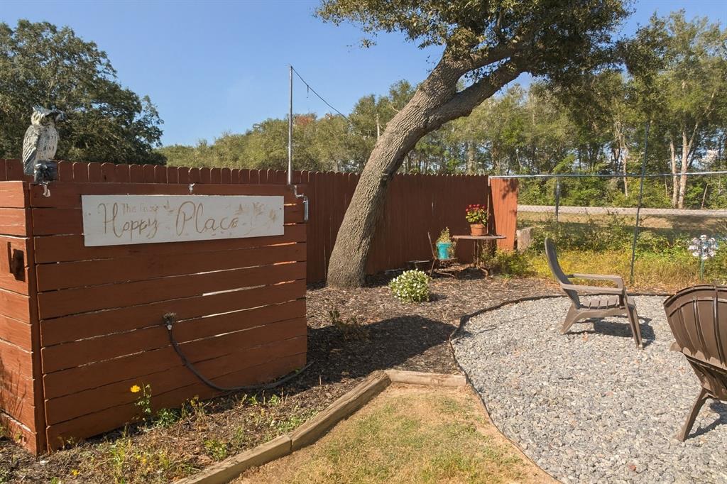 21135 Peckham Avenue Mount Dora, FL 32757 - Photo 29 of 39 a view of a backyard with a sitting area