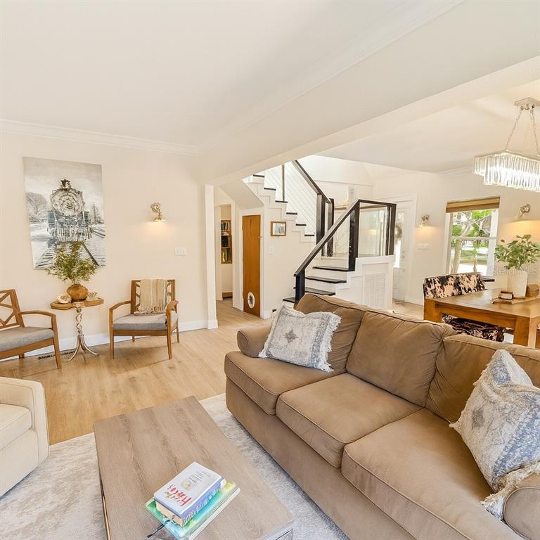 21135 Peckham Avenue Mount Dora, FL 32757 - Photo 3 of 39 a living room with furniture and a couch