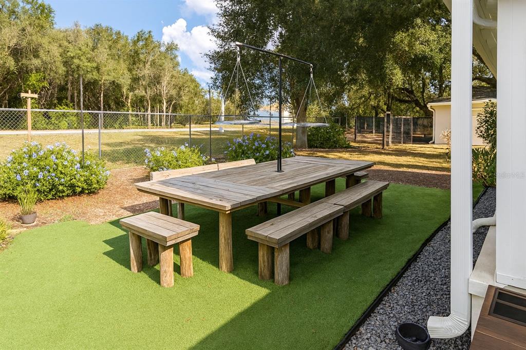 21135 Peckham Avenue Mount Dora, FL 32757 - Photo 32 of 39 an outdoor space with furniture
