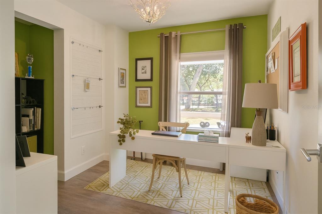 21135 Peckham Avenue Mount Dora, FL 32757 - Photo 9 of 39 a dining room with a window and table chair