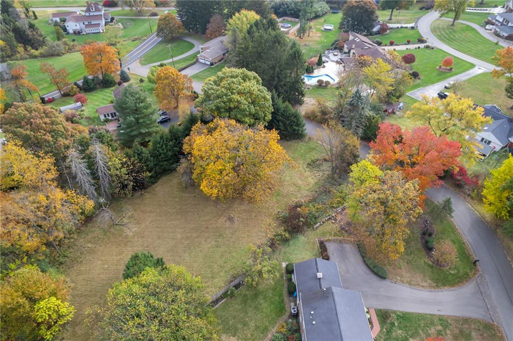 104 Maplewood Drive Beaver, PA 15009 - Photo 2 of 11 an aerial view of a house with a yard and covered with swimming pool