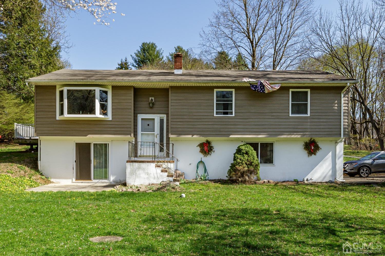 203 Butternut Road Califon, NJ 07830 - Photo 1 of 33 a view of a house with a yard