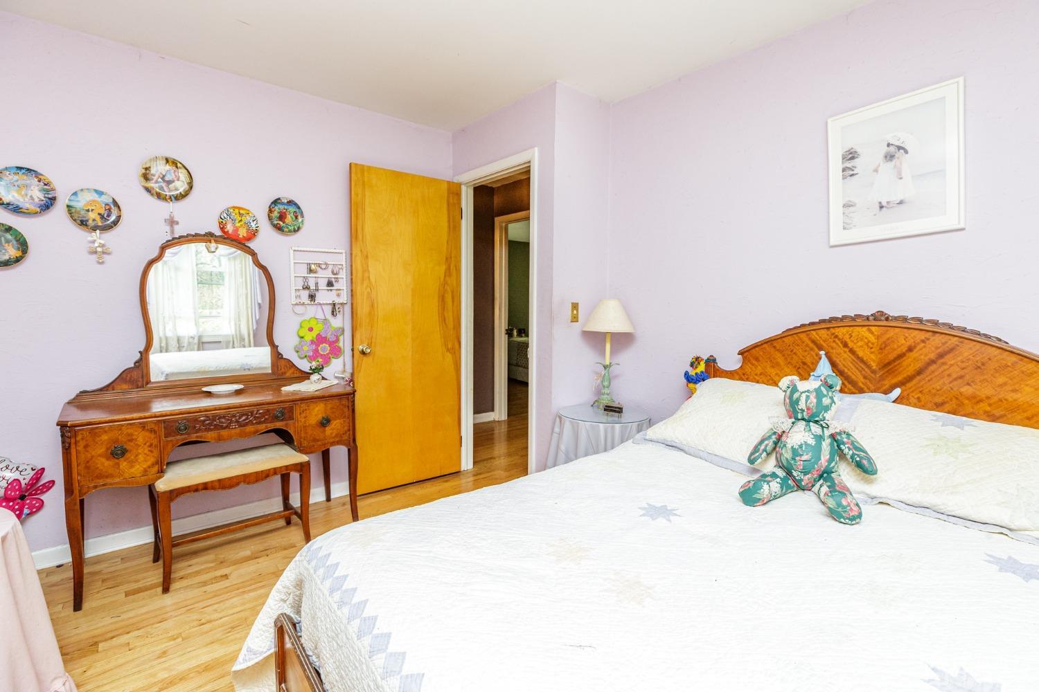 203 Butternut Road Califon, NJ 07830 - Photo 14 of 33 a bedroom with a bed and dresser with mirror