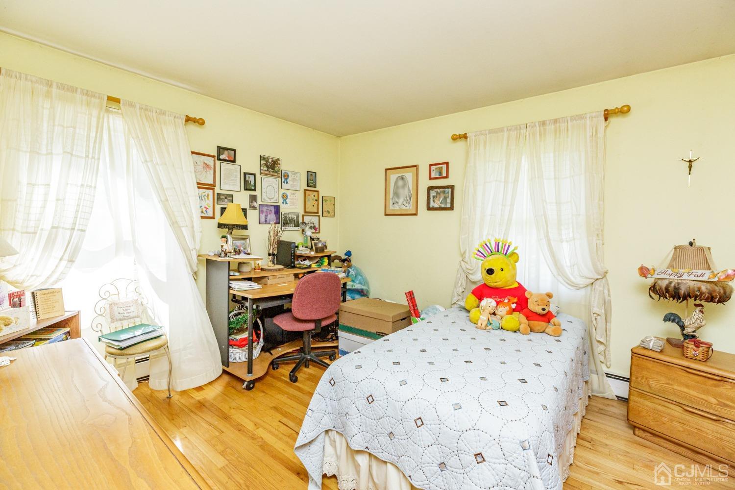 203 Butternut Road Califon, NJ 07830 - Photo 16 of 33 a view of a bedroom with baby toys