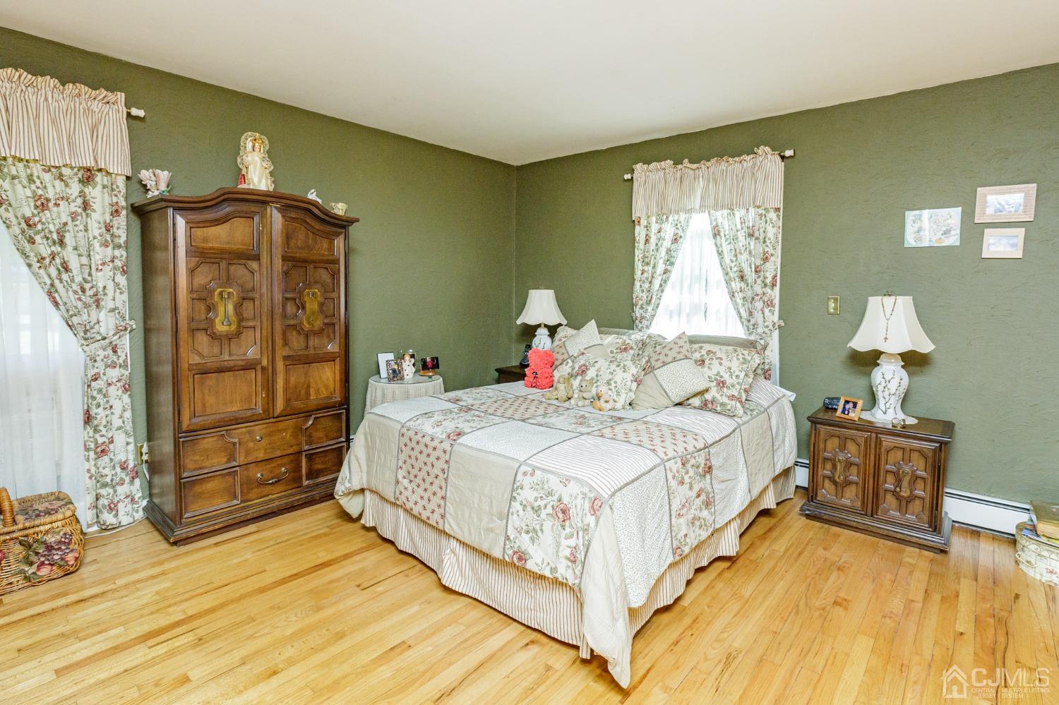 203 Butternut Road Califon, NJ 07830 - Photo 18 of 33 a bedroom with a bed and a window