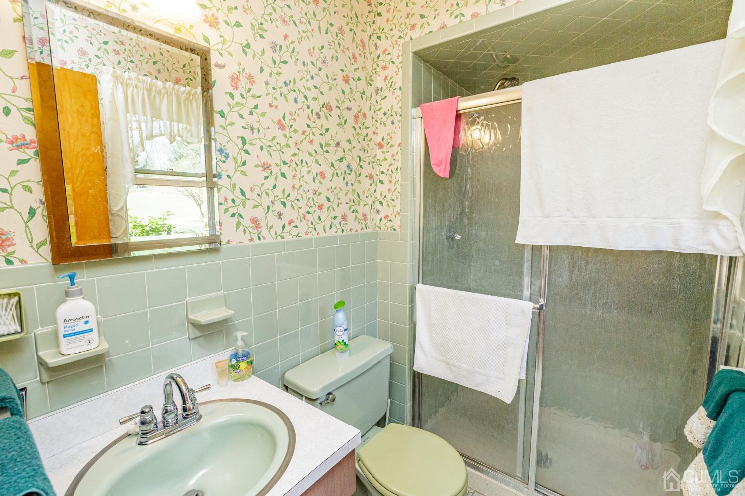 203 Butternut Road Califon, NJ 07830 - Photo 20 of 33 a bathroom with a granite countertop toilet sink and mirror