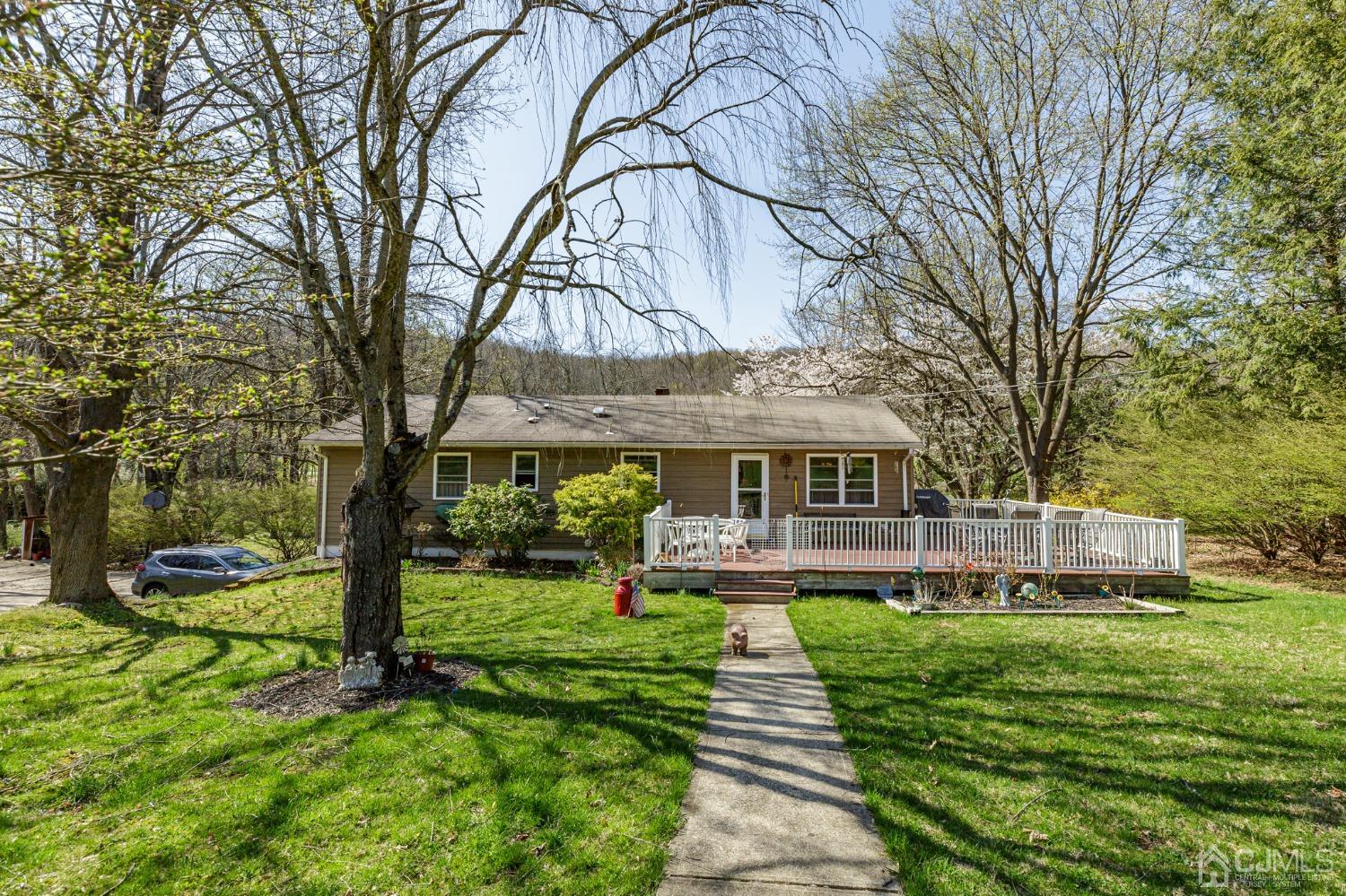 203 Butternut Road Califon, NJ 07830 - Photo 24 of 33 a front view of a house with a yard