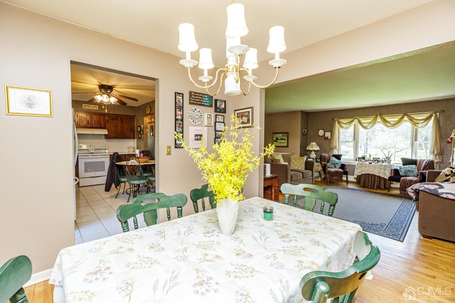 203 Butternut Road Califon, NJ 07830 - Photo 7 of 33 a view of a dining room with furniture and a large window