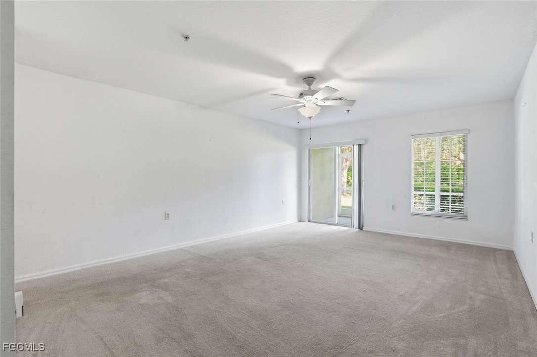 9409 Ivy Brook Run, Unit 1306 Fort Myers, FL 33913 - Photo 17 of 43 a view of an empty room with a window