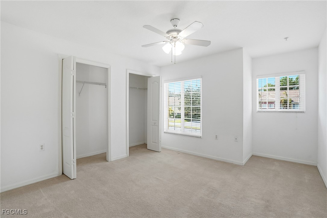 9409 Ivy Brook Run, Unit 1306 Fort Myers, FL 33913 - Photo 23 of 43 a view of an empty room with a window