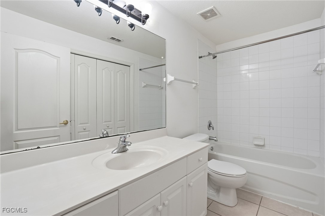 9409 Ivy Brook Run, Unit 1306 Fort Myers, FL 33913 - Photo 27 of 43 a bathroom with a sink toilet and shower