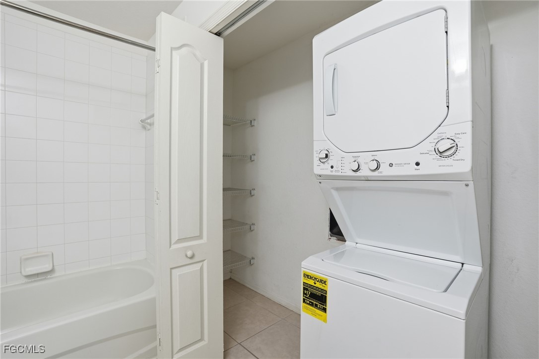 9409 Ivy Brook Run, Unit 1306 Fort Myers, FL 33913 - Photo 32 of 43 a utility room with dryer and washer