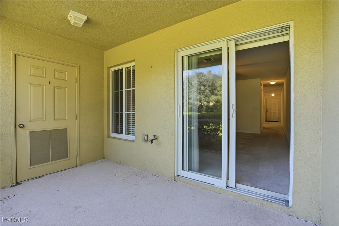 9409 Ivy Brook Run, Unit 1306 Fort Myers, FL 33913 - Photo 33 of 43 a view of an empty room with closet and a window