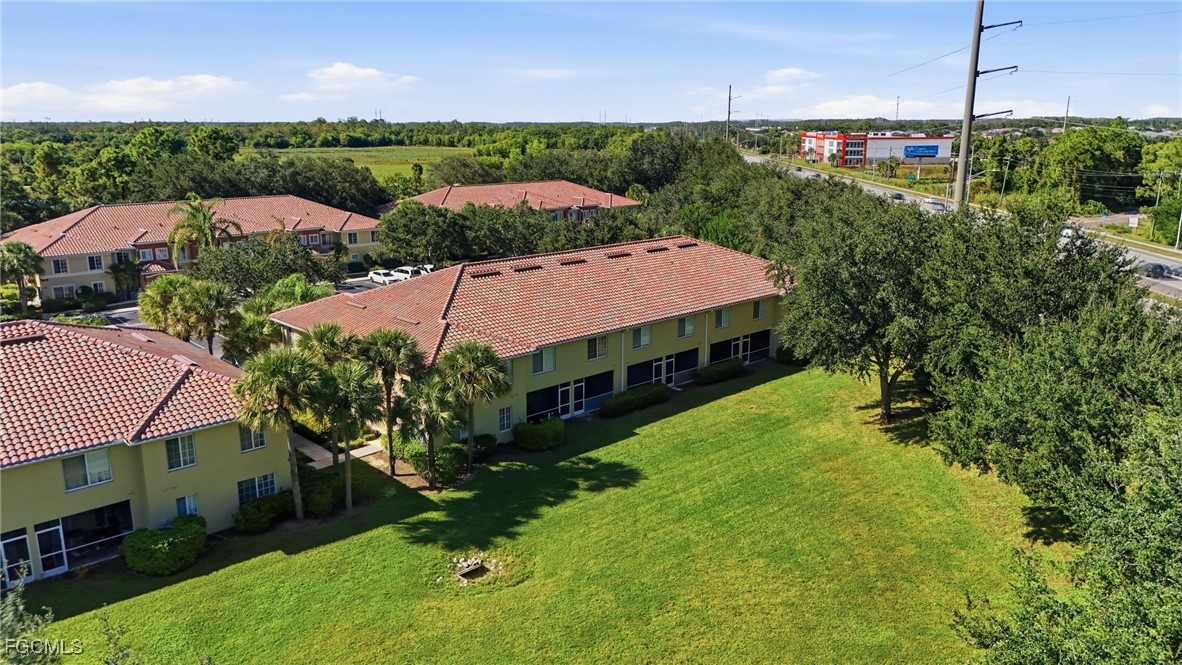 9409 Ivy Brook Run, Unit 1306 Fort Myers, FL 33913 - Photo 36 of 43 a view of a garden with an outdoor space