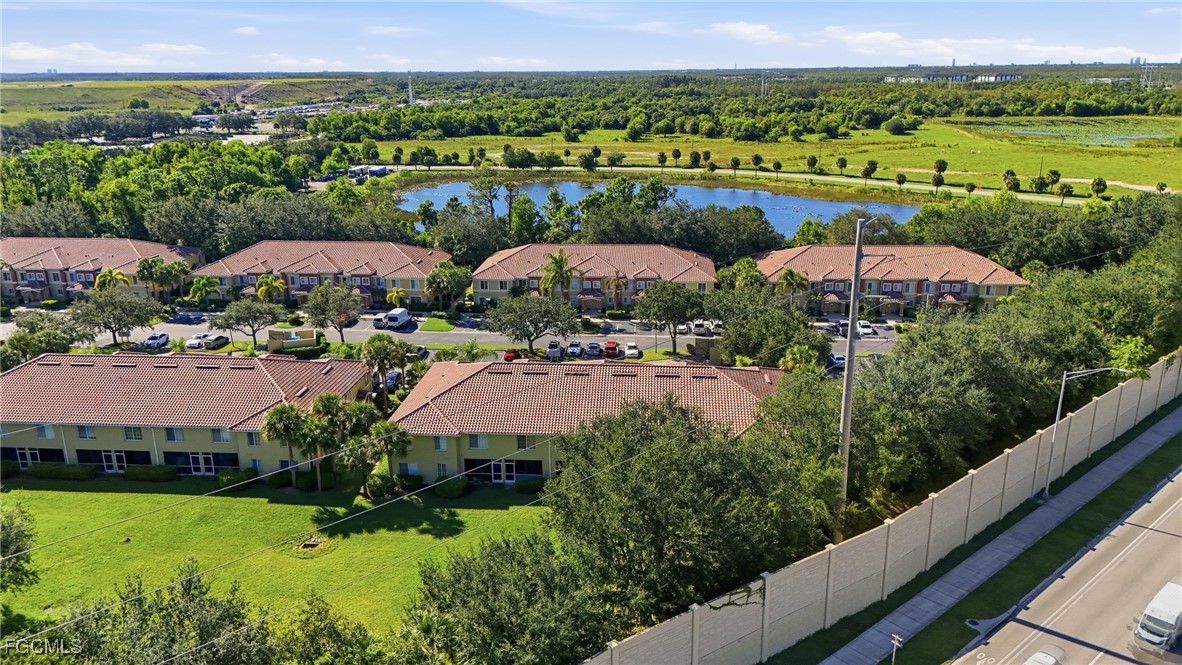 9409 Ivy Brook Run, Unit 1306 Fort Myers, FL 33913 - Photo 37 of 43 a view of a lake with a mountain