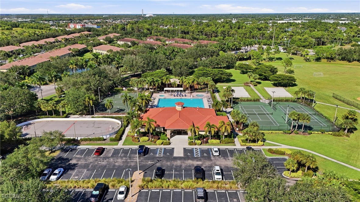 9409 Ivy Brook Run, Unit 1306 Fort Myers, FL 33913 - Photo 43 of 43 an aerial view of houses with yard