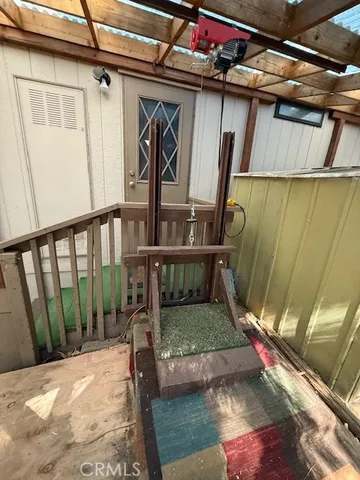 a view of a dining room with furniture and a rug