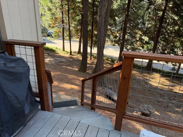 a kitchen with a stove a sink and a refrigerator